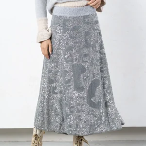 Gonna in paillettes e maglieria argento